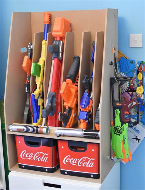 Get those builky plastic guns off the floor with the easy diy nerf gun storage idea! Pin on Storage