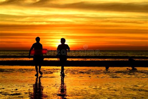 Sunset At The Beautiful Beach View Among The Many People Stock Photo