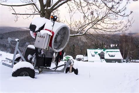 Snow Making Machine On Piste At Ski Resort In Snowy Country Stock Image