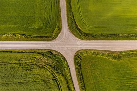 Aerial View Of A Crossroads On Country Gravel No Traffic Road Among