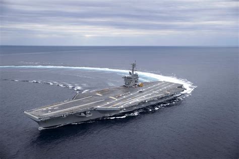 The Nimitz Class Aircraft Carrier USS Abraham Lincoln CVN Conducts High Speed Turn Drills