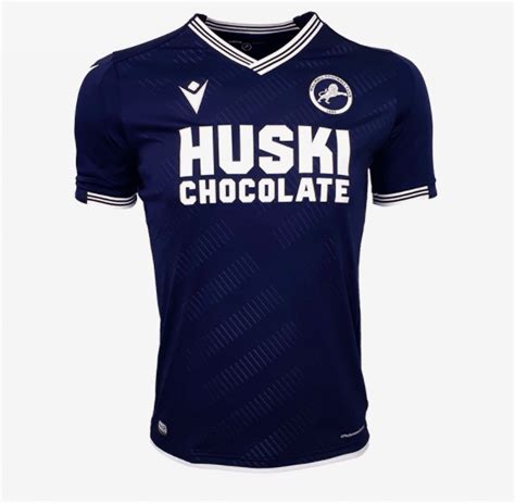 The home goalkeepers' kit is a nice, bright green, with a sort of fingerprint background. Millwall FC 2020-21 Macron Home Kit | The Kitman