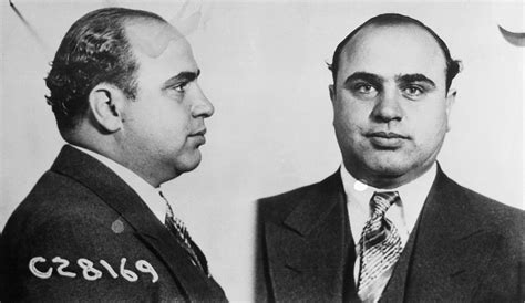gangster-al-capone-smoking-cigar - Al Capone and Prohibition Pictures