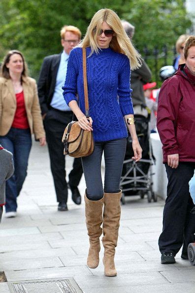 claudia schiffer over the knee boots blue sweater outfit trendy brown boots winter sweater