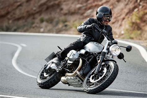 The elegant seat, the matte steel tank, the analogue. BMW R NineT Scrambler