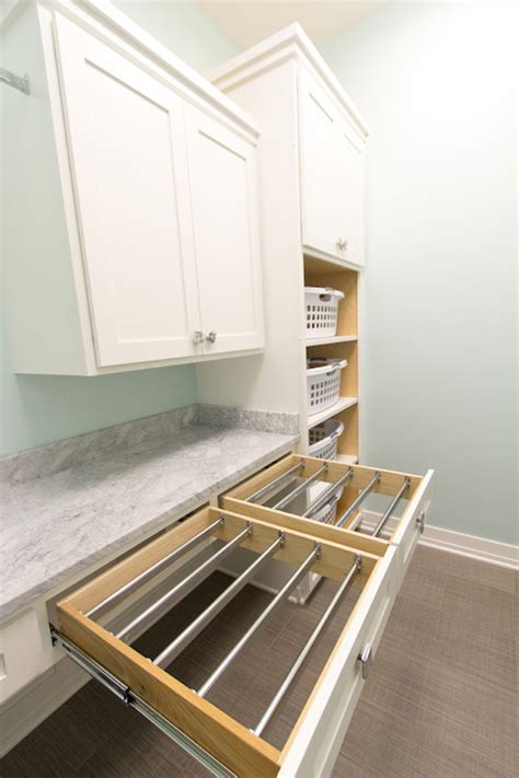 Pull out baskets, drawers, and cabinet doors help you keep all of your laundry needs organised. Drying Rack - Transitional - laundry room - Rautmann ...