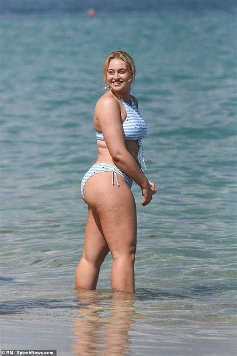 iskra lawrence shows off phenomenal curves in bright bikinis artofit