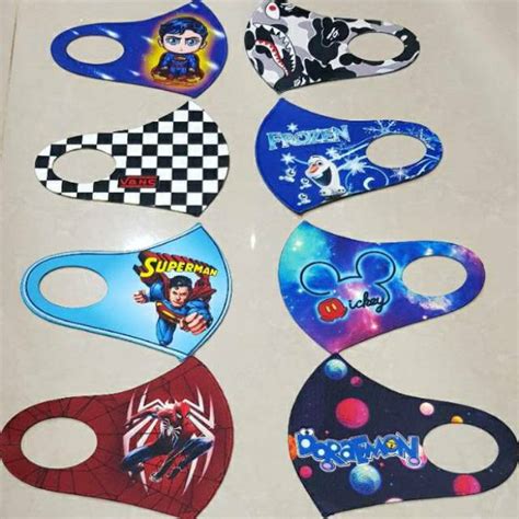 MASKER ANAK KARTUN TIDAK LUNTUR (BERGARANSI) , 1 MASKER 2 MOTIF BERBEDA