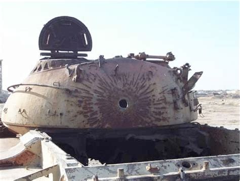An Old Tank Sitting In The Middle Of Nowhere