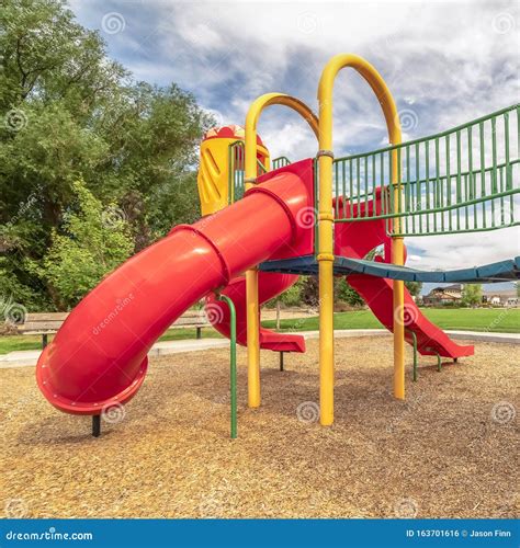 Square Close Up View Of The Colorful Playground With Red Closed Tube