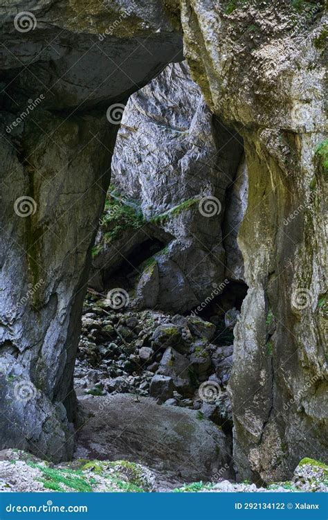 Entrance Of A Cave In The Mountains Stock Photo Image Of Mountains