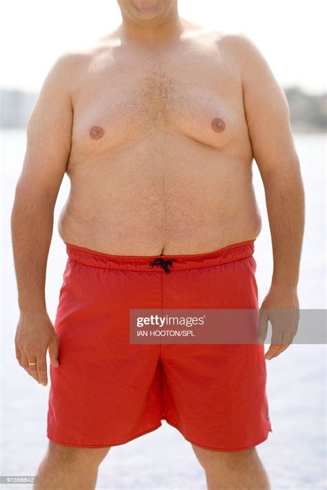 Overweight Man Wearing Swimming Trunks Photo Getty Images