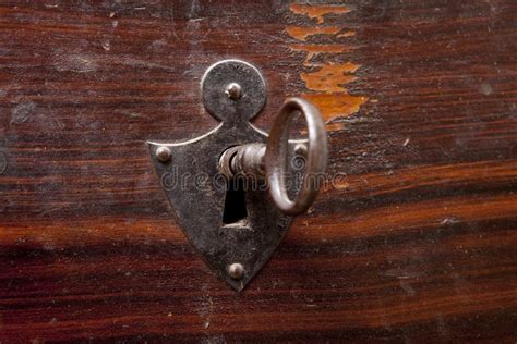 Rusty Lock With Old Key On Wooden Chest Close Up Stock Photo Image
