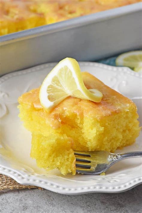 Easy Lemon Poke Cake With Lemon Glaze Adventures Of Mel