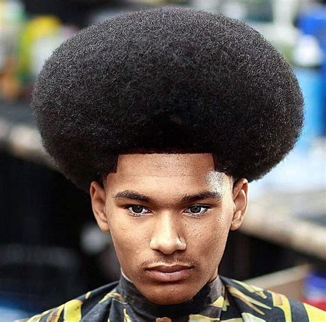 With shaved hair on the sides and back and longer hair on top, this classic male cut gets a whole new life when done in a platinum color on females. 19 best afro-hairstyles-hairstyles-ideas-for-mens/ images ...
