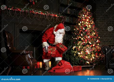 Christmas Night Santa Claus Puts Gifts Stock Photo Image Of Golden Happiness