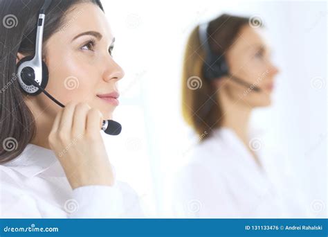 Group Of Call Center Operators At Work Focus On Beautiful Business