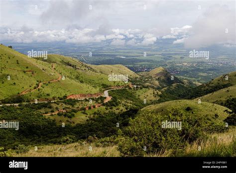 Magnificant View Of Green Hills Under Cloudy Sky Stock Photo Alamy