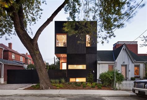 Black Siding With Natural Wood Accents For This Toronto Home