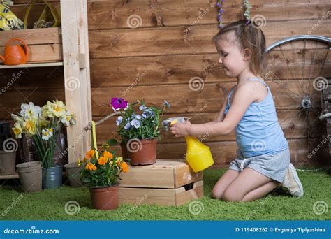 Baby Girl Plant Flowers Stock Photo Image Of Girl Nature