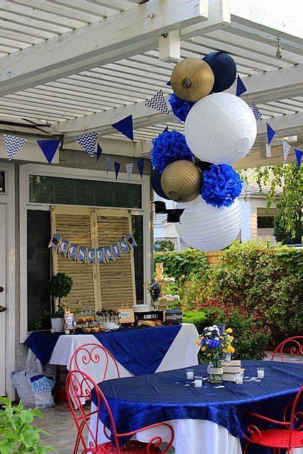 Hanging Centerpiece In Gold Royal Blue And White Graduation Party