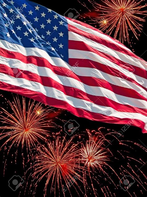 The American Flag And A Fireworks Display Stock Photo Picture And