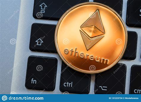 Cryptocurrency Ethereum Coin On Computer Laptop Keyboard ...