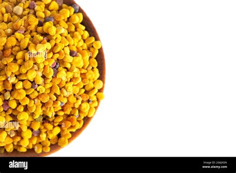 A Bowl Of Pellets Of Yellow Bee Pollen Stock Photo Alamy