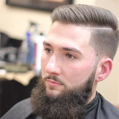 cool men low fade haircut with beard