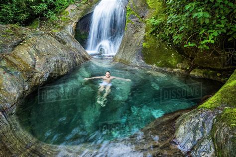 Man Swimming In Beautiful Atlantic Rainforest River With
