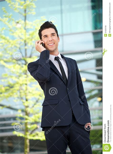 Happy Businessman Talking On Mobile Phone Outdoors Stock Photo Image