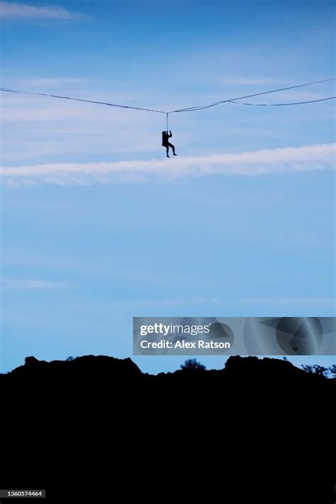 A Slackliner Falls From A Highline And Is Caught By His Harness While