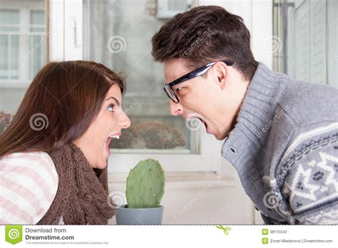 Couple Yelling At Each Other Shouting Face To Face Stock
