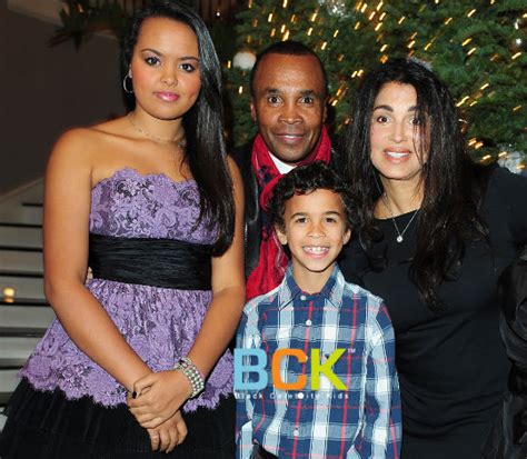 On celebrity family feud, while former professional boxer laila ali competes against actor george hamilton, rapper snoop dogg and his family will play against former boxing champion sugar ray leonard and his family. SUGAR RAY AND FAMILY POSE FOR THE CAMERAS