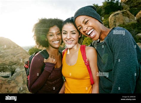 Portrait Of Smiling Women Hiking Stock Photo Alamy