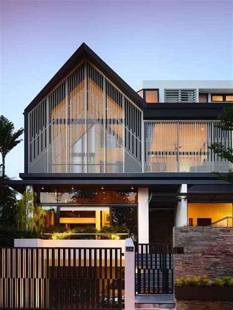 Slatted Facade House With Sleek Adjoined Apartment