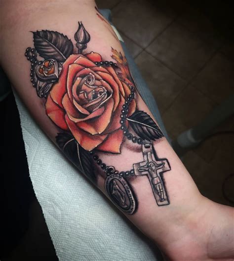 Religious Forearm Tattoo