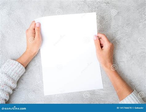 Girl S Hands Holding Sheet Of Paper Stock Photo Image Of Holding