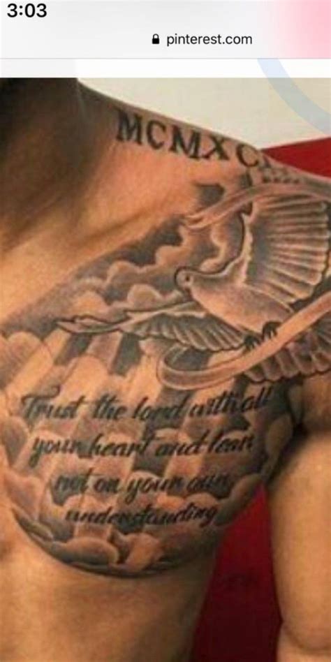 A Man S Chest With An Eagle And Bible Verse Tattooed On The Upper Half