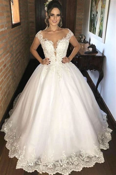They are also a great option for a second look, rehearsal. Lace Cap Sleeves Ivory Bridal Gown with Illusion Neckline ...