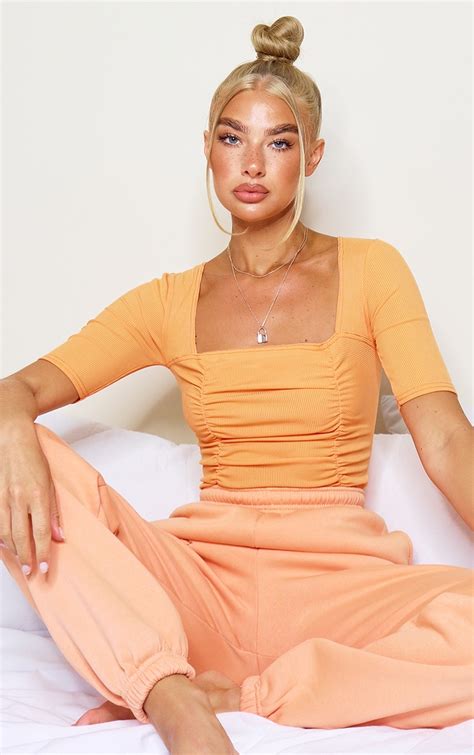 Pastel Orange Ruched Short Sleeve Bodysuit Prettylittlething