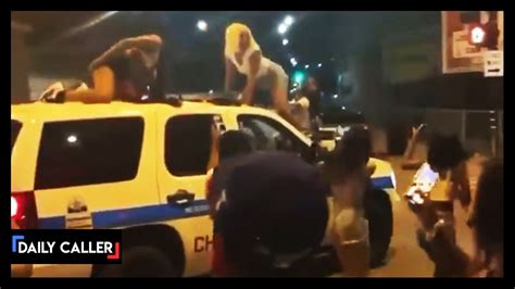women seen twerking on chicago police car vid trending