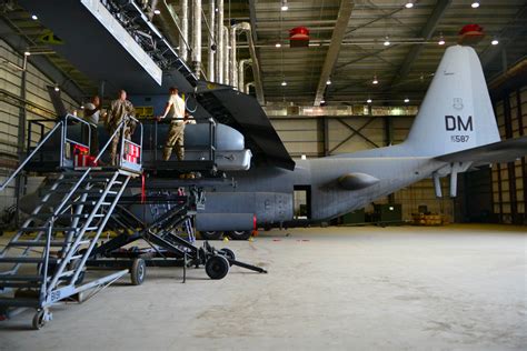 Us Airmen Perform Maintenance On An Ec 130h Compass Call Aircraft On