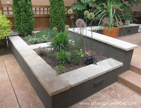 Even though the cinder block material is bit expensive, it is worth to use. Home landscape designs | Cinder block garden, Garden landscape design, Cinder block garden wall