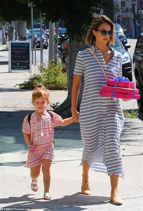 Jessica Alba Takes Daughter Haven To A Birthday Party As They Coordinate In Striped Dresses