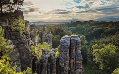 4539238 Trees Hills Grass Forest Rock Landscape Clouds