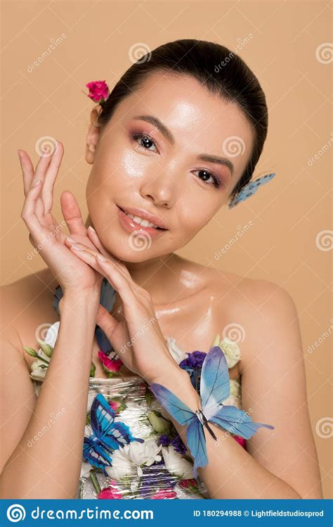 Attractive Tender Naked Asian Girl In Flowers With Butterflies On Body