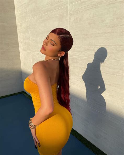 kylie jenner shows off curves in skin tight mustard dress as she boasts redheads have a lot of