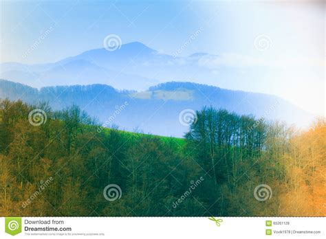 Landscape In The Mountainsnowy Tops And Green Valleys Stock Photo