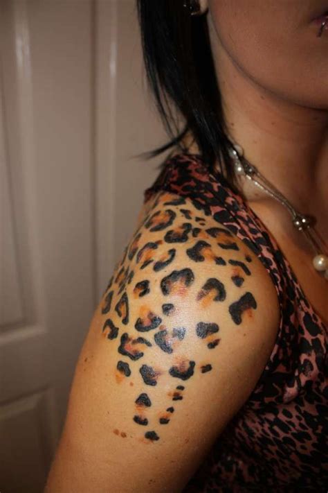 Cheetah Print With Bow Tattoos On Shoulder